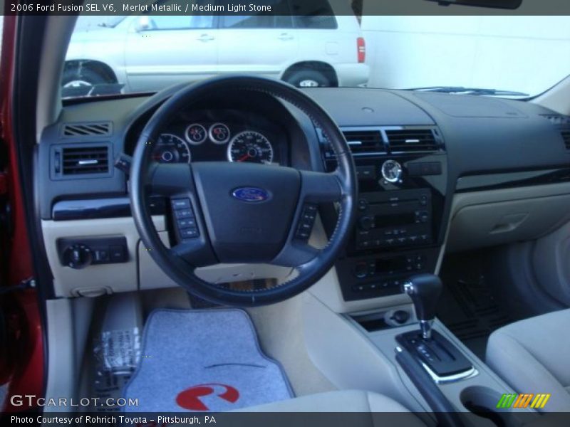 Merlot Metallic / Medium Light Stone 2006 Ford Fusion SEL V6