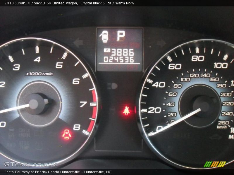 Crystal Black Silica / Warm Ivory 2010 Subaru Outback 3.6R Limited Wagon