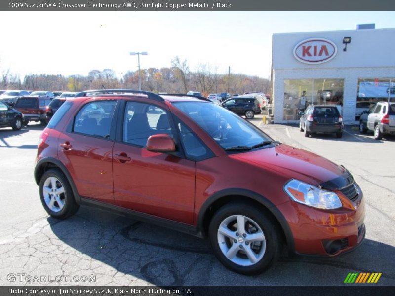 Sunlight Copper Metallic / Black 2009 Suzuki SX4 Crossover Technology AWD