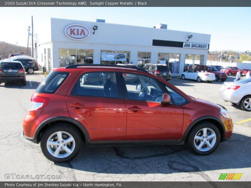 Sunlight Copper Metallic / Black 2009 Suzuki SX4 Crossover Technology AWD