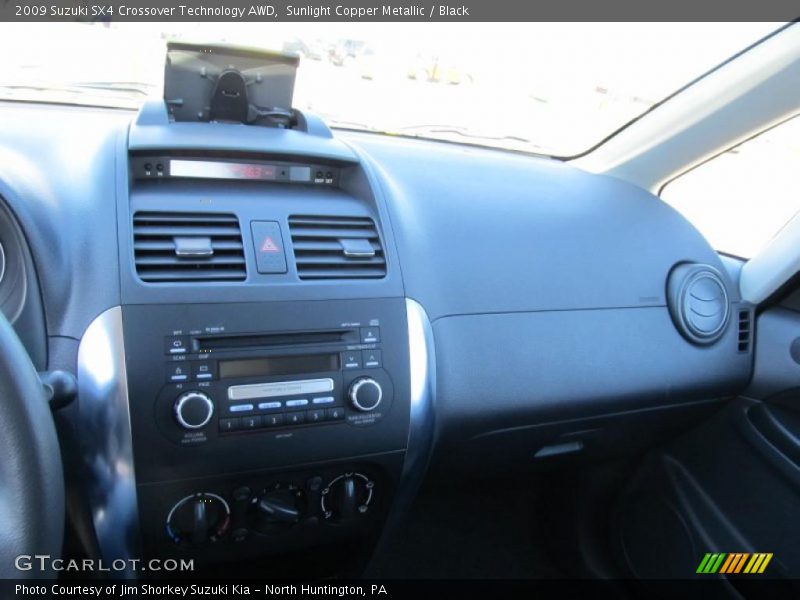 Sunlight Copper Metallic / Black 2009 Suzuki SX4 Crossover Technology AWD