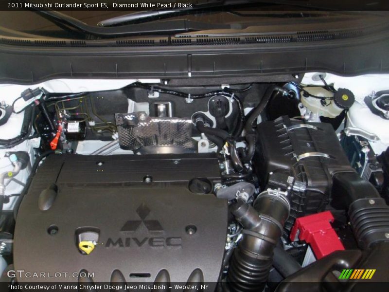 Diamond White Pearl / Black 2011 Mitsubishi Outlander Sport ES