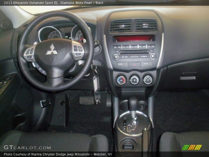 Diamond White Pearl / Black 2011 Mitsubishi Outlander Sport ES