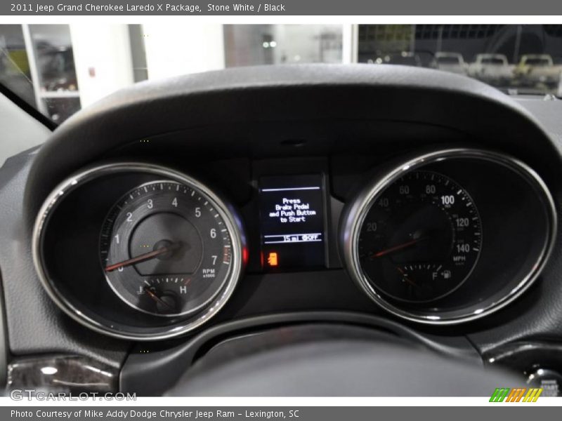 Stone White / Black 2011 Jeep Grand Cherokee Laredo X Package