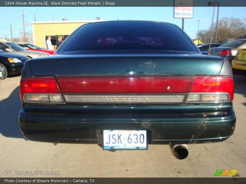 Black Emerald Pearl Metallic / Beige 1994 Nissan Maxima SE