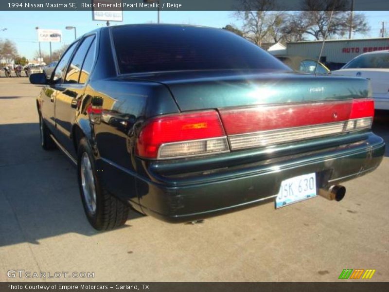 Black Emerald Pearl Metallic / Beige 1994 Nissan Maxima SE