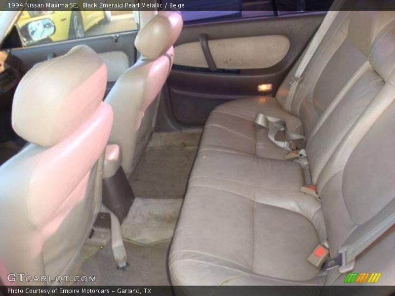 Black Emerald Pearl Metallic / Beige 1994 Nissan Maxima SE