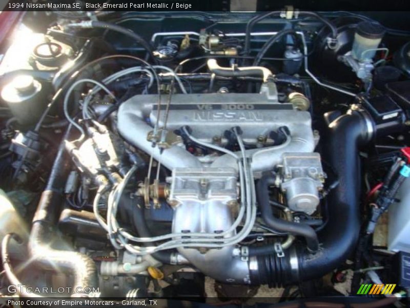 Black Emerald Pearl Metallic / Beige 1994 Nissan Maxima SE