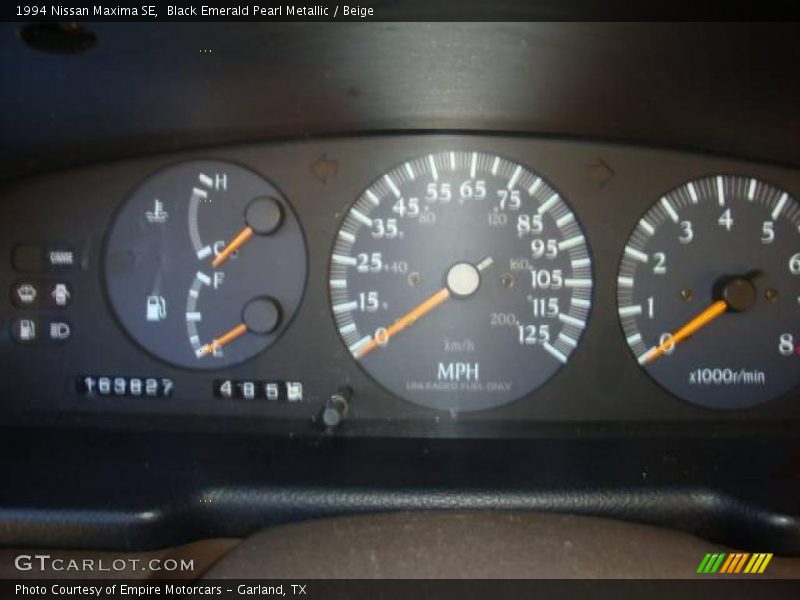 Black Emerald Pearl Metallic / Beige 1994 Nissan Maxima SE