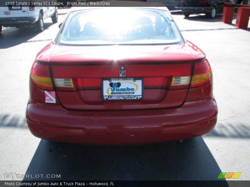 Bright Red / Black/Gray 1998 Saturn S Series SC1 Coupe