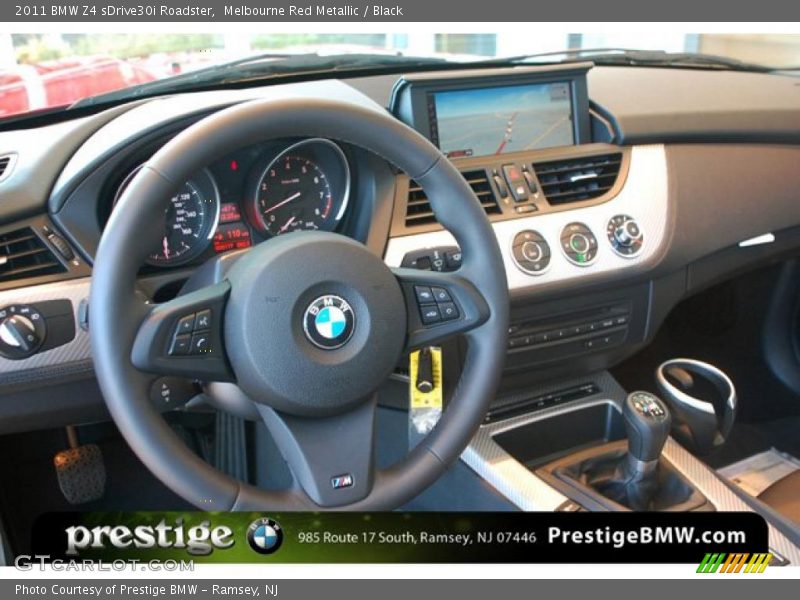 Melbourne Red Metallic / Black 2011 BMW Z4 sDrive30i Roadster