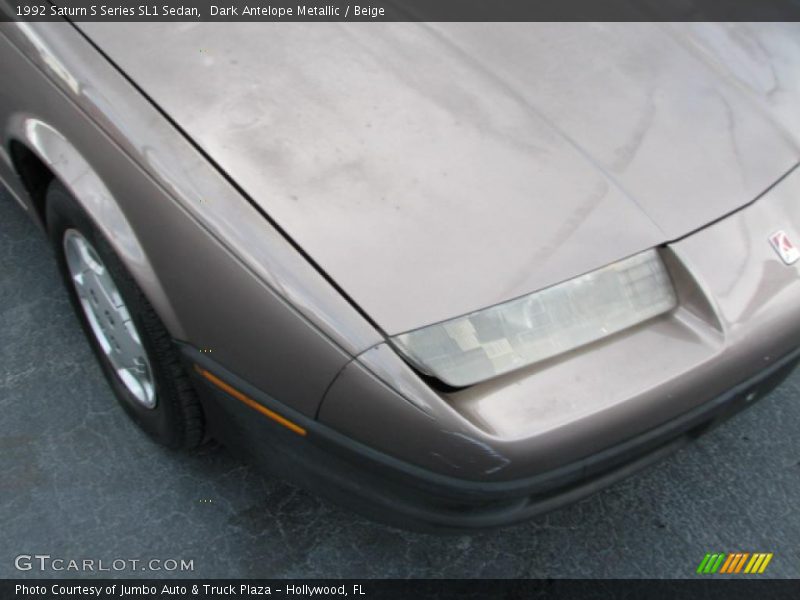 Dark Antelope Metallic / Beige 1992 Saturn S Series SL1 Sedan