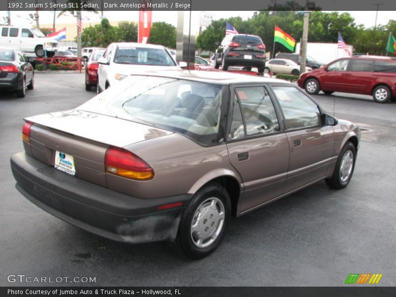 Dark Antelope Metallic / Beige 1992 Saturn S Series SL1 Sedan