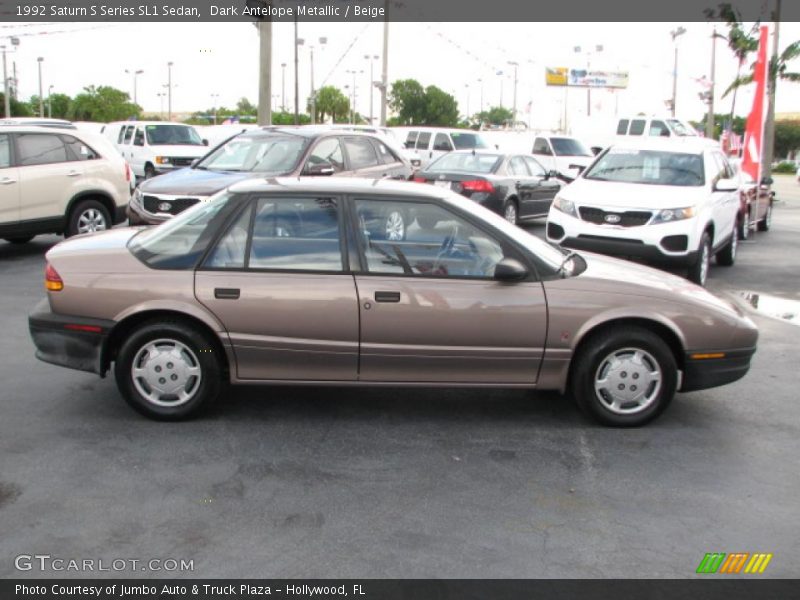 Dark Antelope Metallic / Beige 1992 Saturn S Series SL1 Sedan