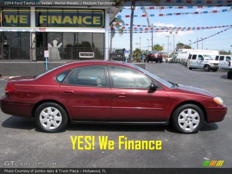 Merlot Metallic / Medium Parchment 2004 Ford Taurus LX Sedan