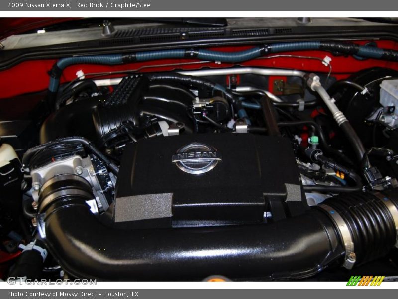 Red Brick / Graphite/Steel 2009 Nissan Xterra X