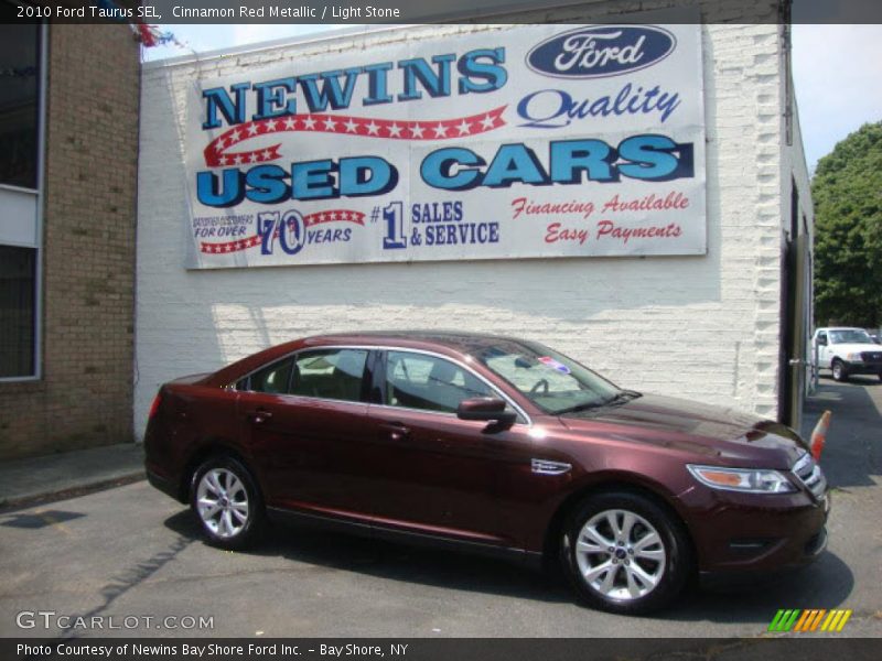 Cinnamon Red Metallic / Light Stone 2010 Ford Taurus SEL