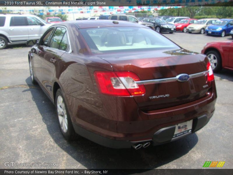 Cinnamon Red Metallic / Light Stone 2010 Ford Taurus SEL