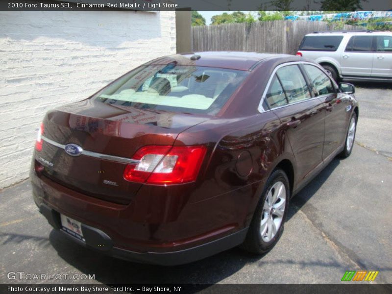 Cinnamon Red Metallic / Light Stone 2010 Ford Taurus SEL