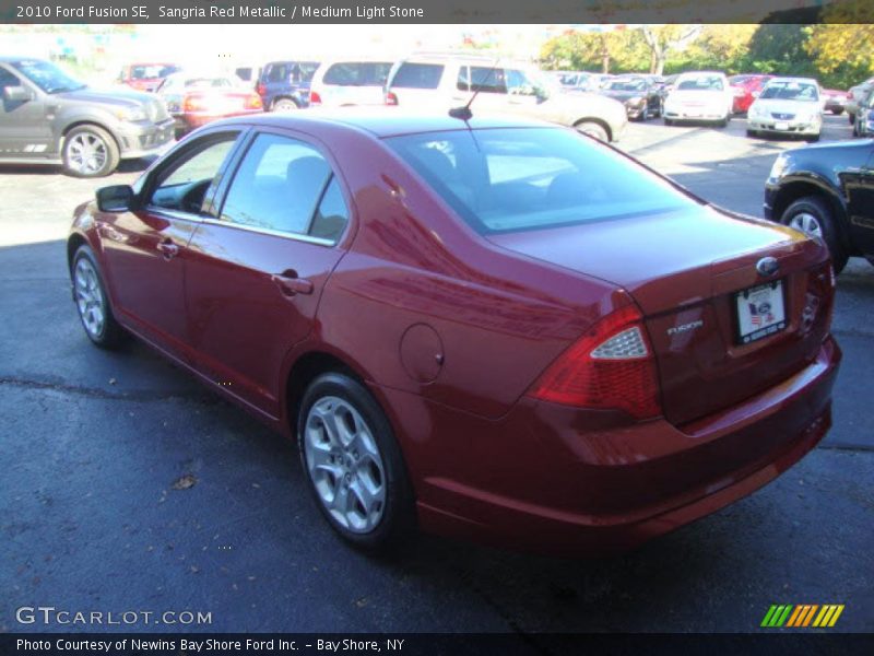 Sangria Red Metallic / Medium Light Stone 2010 Ford Fusion SE