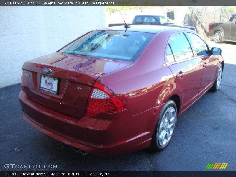 Sangria Red Metallic / Medium Light Stone 2010 Ford Fusion SE