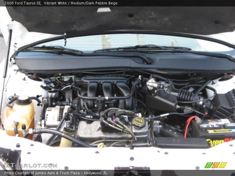 Vibrant White / Medium/Dark Pebble Beige 2006 Ford Taurus SE