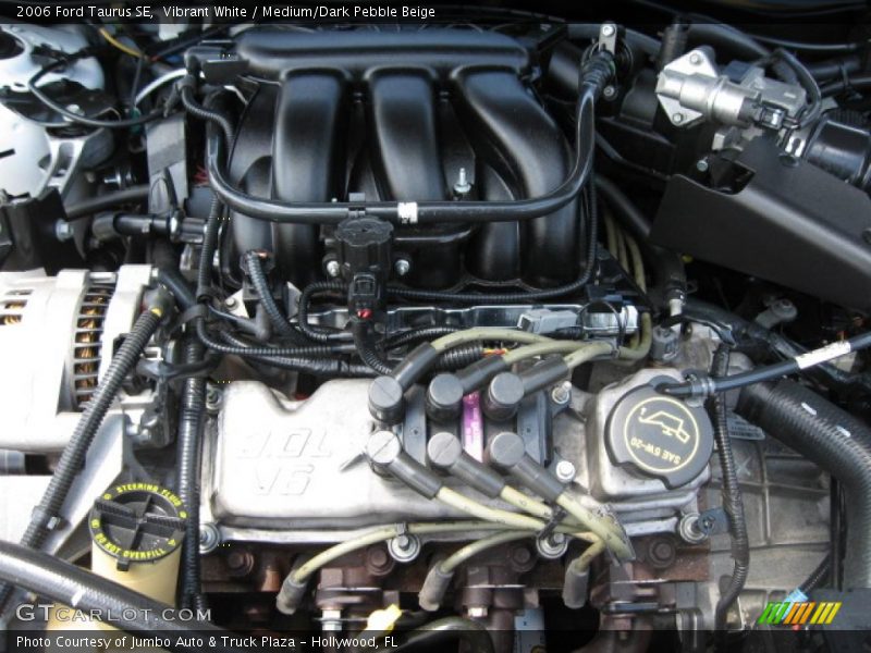 Vibrant White / Medium/Dark Pebble Beige 2006 Ford Taurus SE