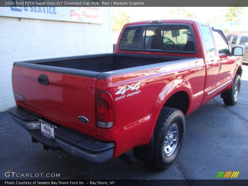 Red / Medium Graphite 2000 Ford F250 Super Duty XLT Extended Cab 4x4