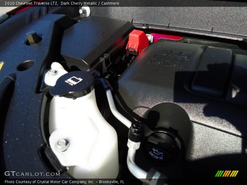 Dark Cherry Metallic / Cashmere 2010 Chevrolet Traverse LTZ