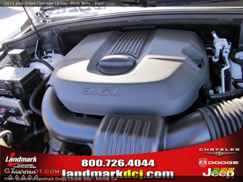 Stone White / Black 2011 Jeep Grand Cherokee Laredo
