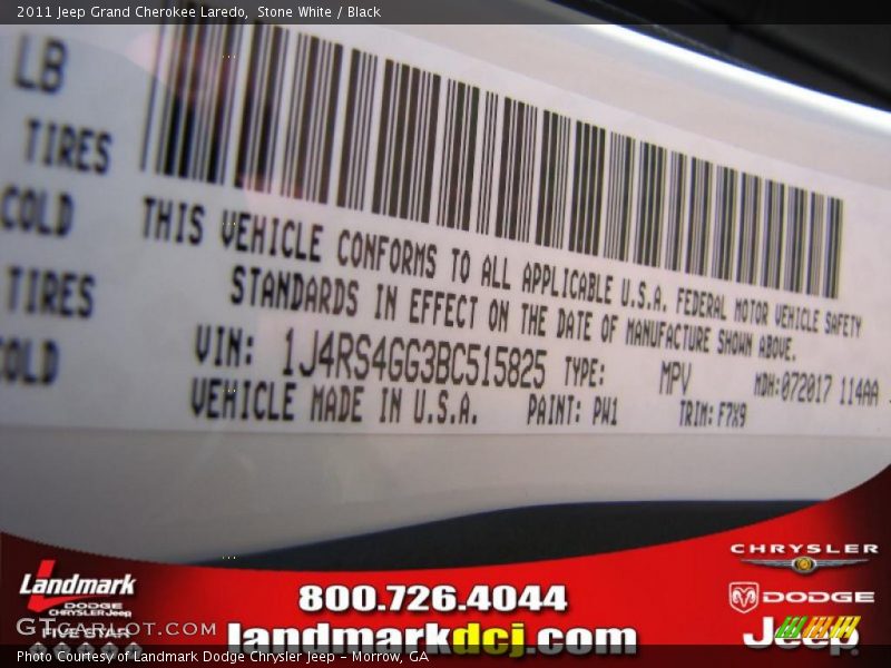 Stone White / Black 2011 Jeep Grand Cherokee Laredo
