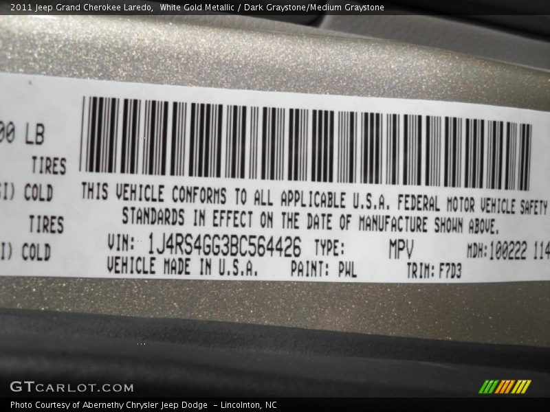 White Gold Metallic / Dark Graystone/Medium Graystone 2011 Jeep Grand Cherokee Laredo