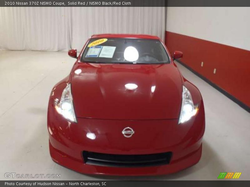 Solid Red / NISMO Black/Red Cloth 2010 Nissan 370Z NISMO Coupe