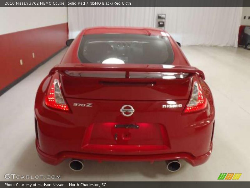 Solid Red / NISMO Black/Red Cloth 2010 Nissan 370Z NISMO Coupe