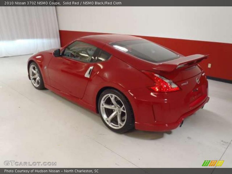 Solid Red / NISMO Black/Red Cloth 2010 Nissan 370Z NISMO Coupe