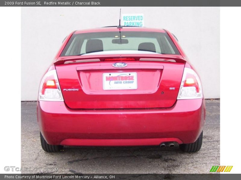 Redfire Metallic / Charcoal Black 2009 Ford Fusion SE