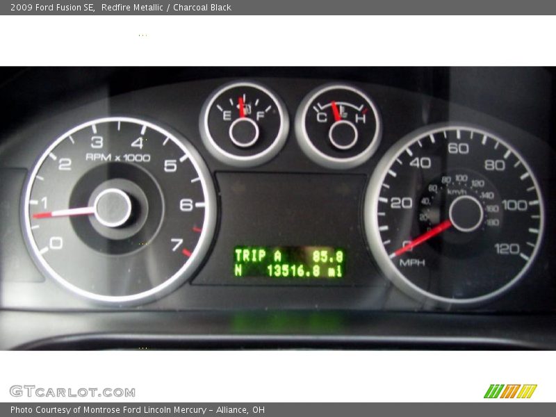 Redfire Metallic / Charcoal Black 2009 Ford Fusion SE