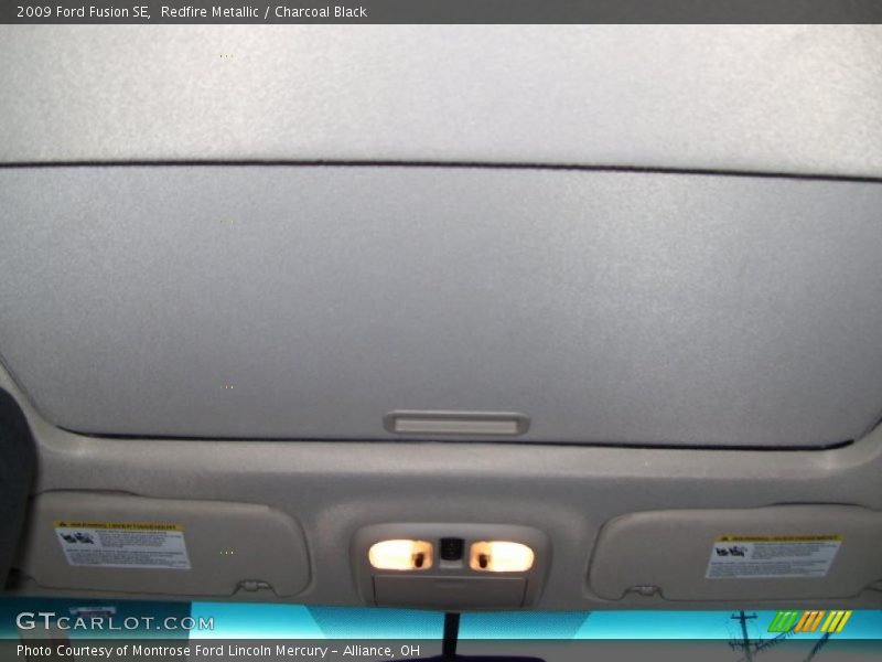 Redfire Metallic / Charcoal Black 2009 Ford Fusion SE