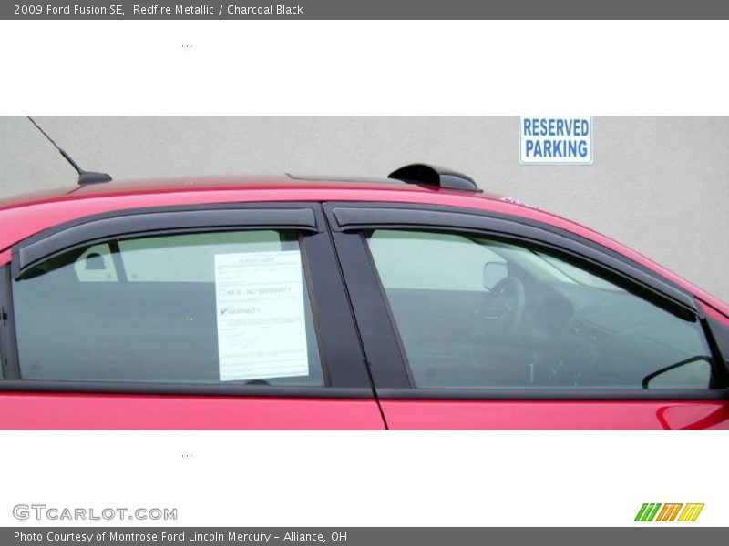 Redfire Metallic / Charcoal Black 2009 Ford Fusion SE