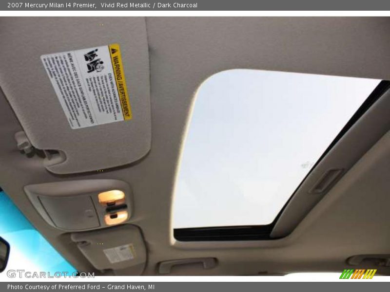 Vivid Red Metallic / Dark Charcoal 2007 Mercury Milan I4 Premier