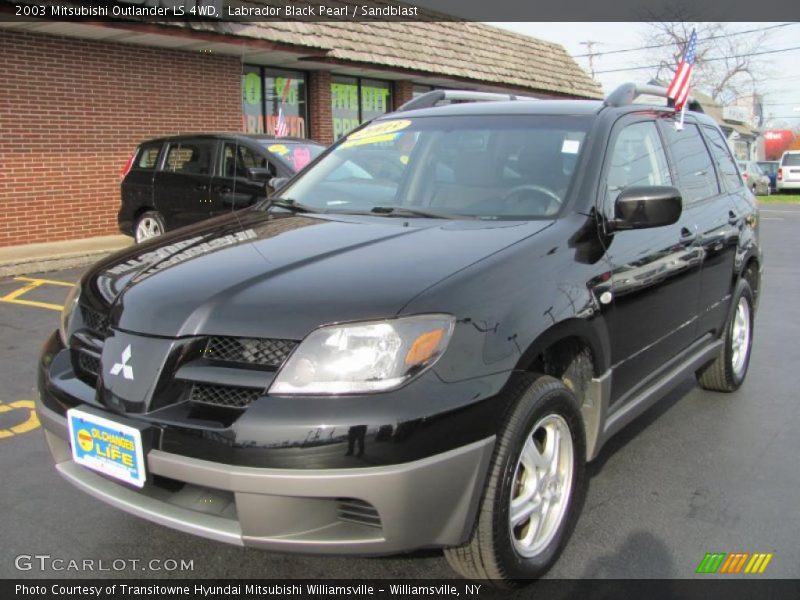 Front 3/4 View of 2003 Outlander LS 4WD