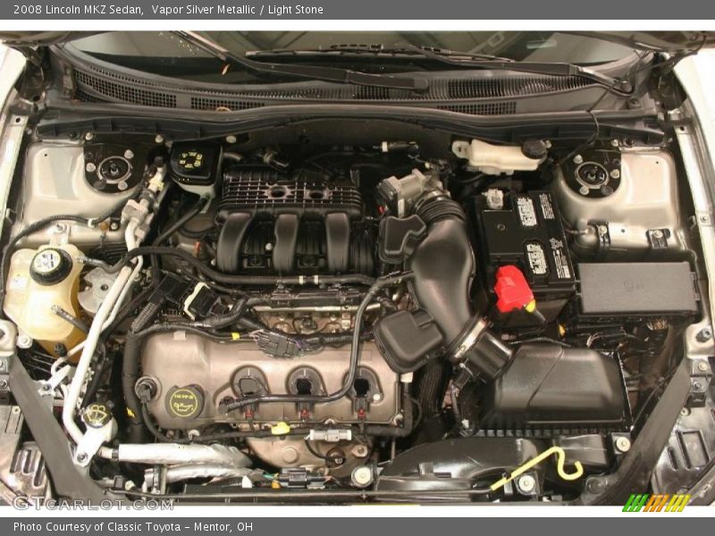 Vapor Silver Metallic / Light Stone 2008 Lincoln MKZ Sedan