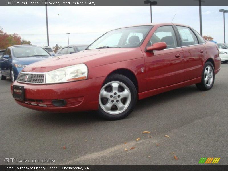 Front 3/4 View of 2003 L Series L300 Sedan