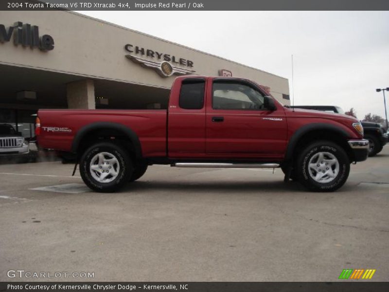 Impulse Red Pearl / Oak 2004 Toyota Tacoma V6 TRD Xtracab 4x4