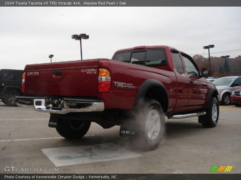Impulse Red Pearl / Oak 2004 Toyota Tacoma V6 TRD Xtracab 4x4