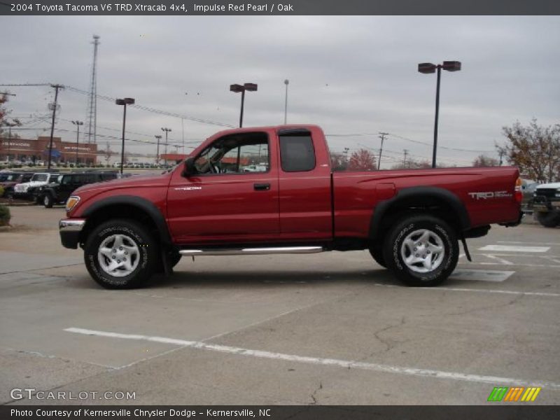 Impulse Red Pearl / Oak 2004 Toyota Tacoma V6 TRD Xtracab 4x4