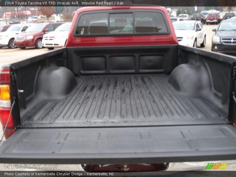 Impulse Red Pearl / Oak 2004 Toyota Tacoma V6 TRD Xtracab 4x4