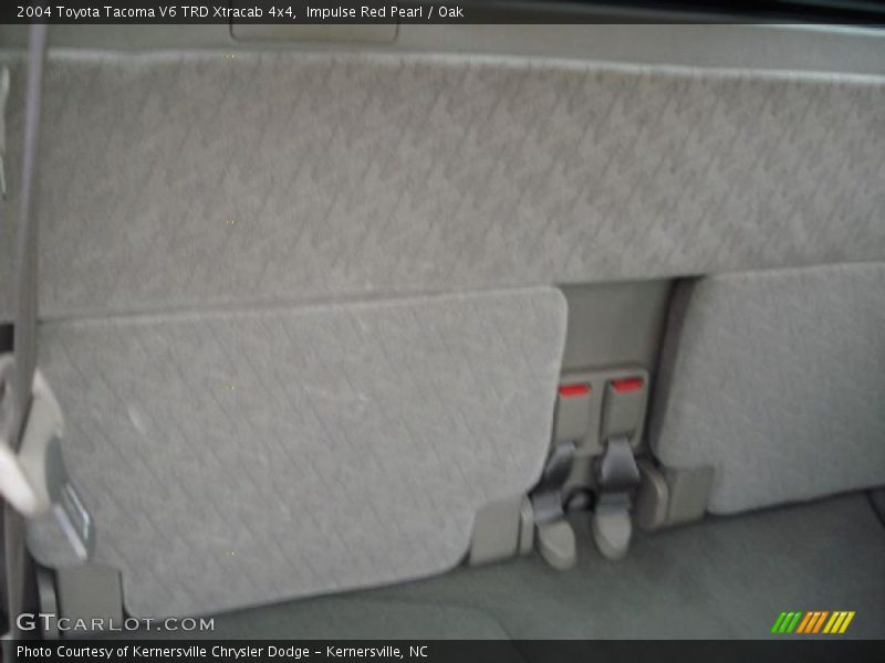 Impulse Red Pearl / Oak 2004 Toyota Tacoma V6 TRD Xtracab 4x4