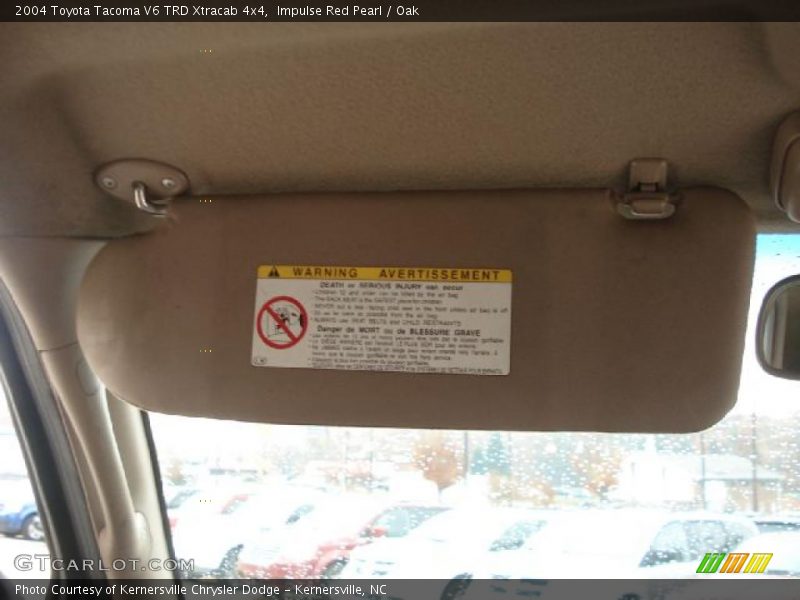 Impulse Red Pearl / Oak 2004 Toyota Tacoma V6 TRD Xtracab 4x4