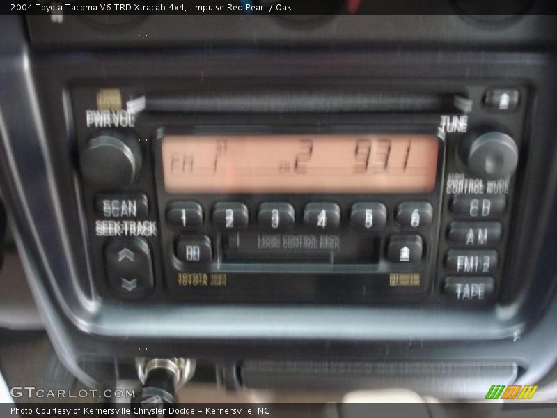 Impulse Red Pearl / Oak 2004 Toyota Tacoma V6 TRD Xtracab 4x4